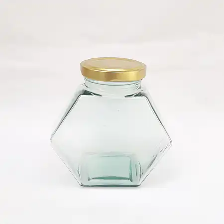 تصویر محصول جار شیشه عسل نیم کیلو مدل کندو با درب فلزی 58 میلیمتر